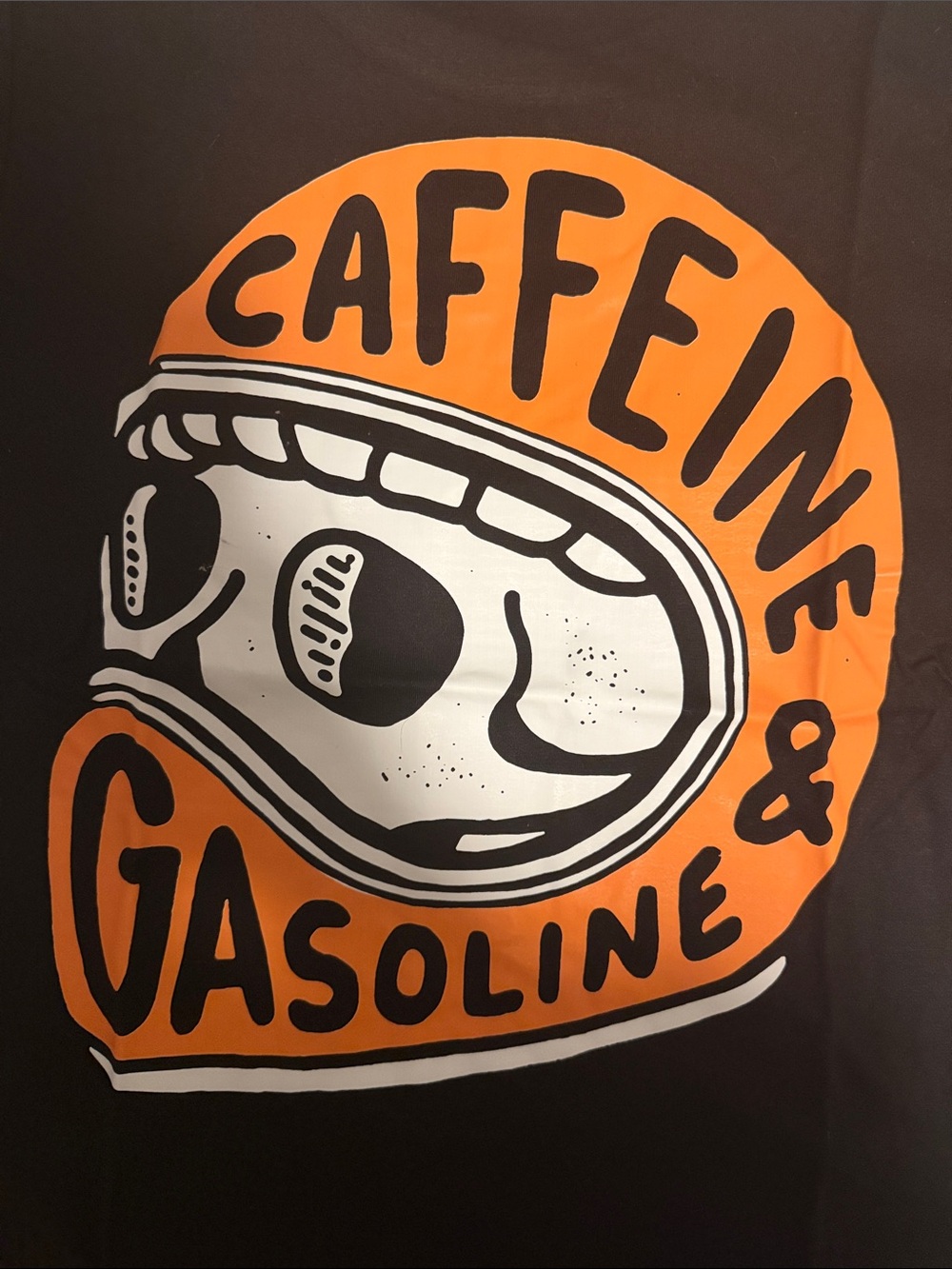 Graphic Short Sleeve Tee “CAFFEINE AND GASOLINE”, in Black and Orange.